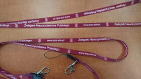 Smycz reklamowa ZNP z karabińczykiem i uchwytem GSM